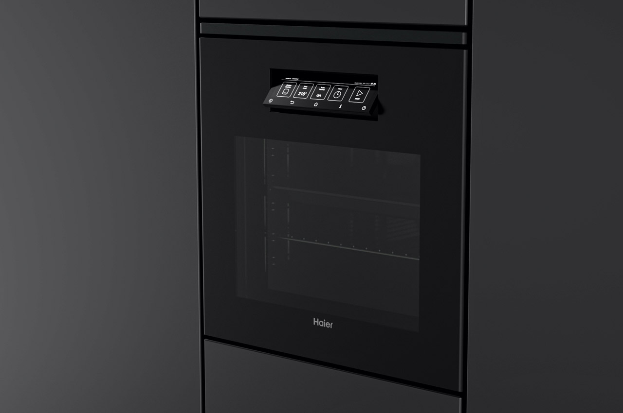 #This sleek built-in oven features an interface panel that doubles up as a hidden handle