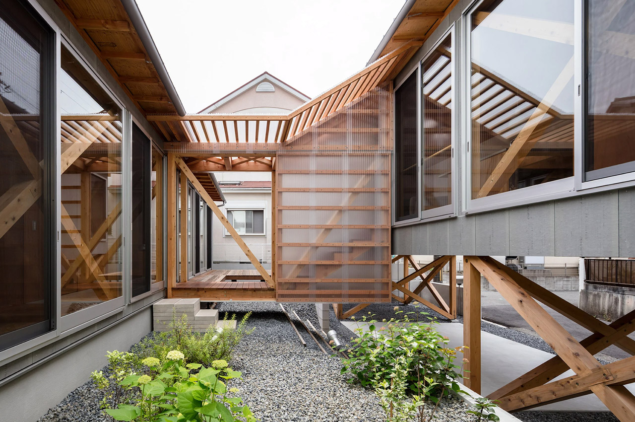 #This beautiful Japanese timber home is split in two with a peaceful central courtyard