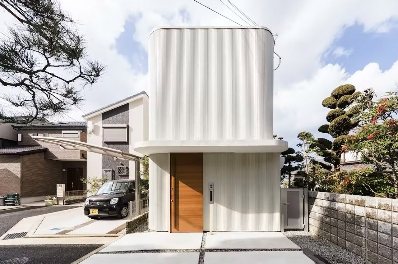 This minimal Japanese home with an indoor garden was designed to help a young family “feel green”