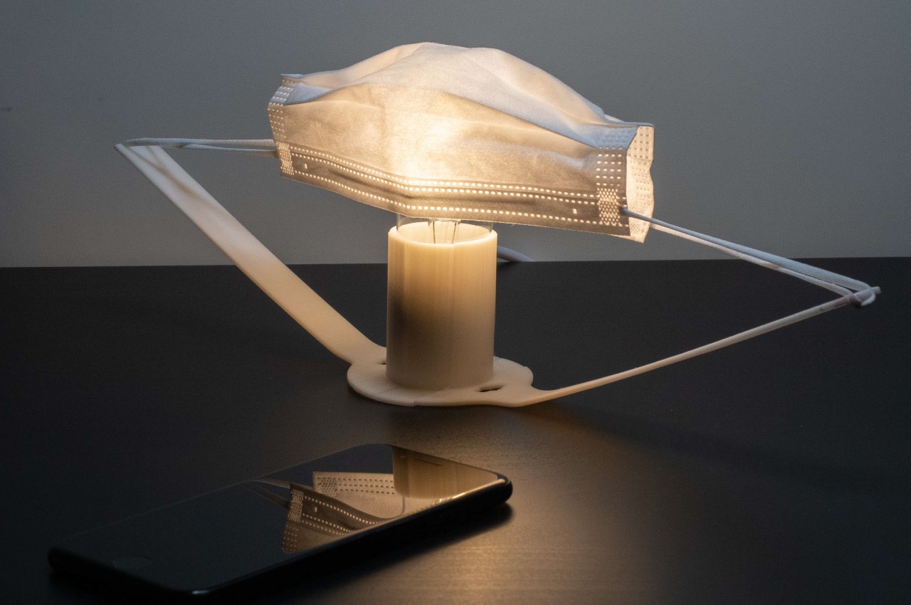 #This face mask lampshade is a memorial to humanity’s most recent tragedy