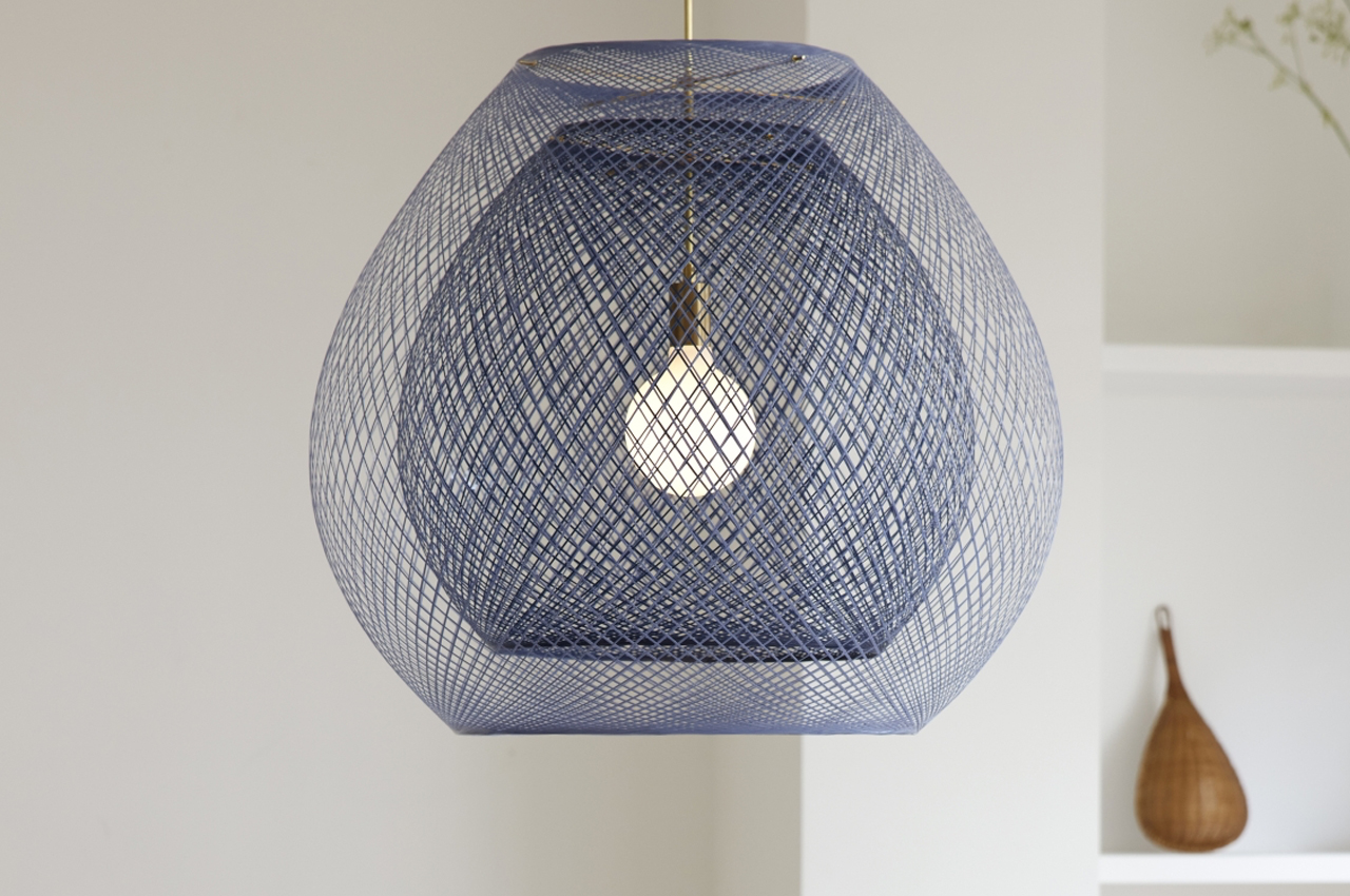 #This pendant lamp captures the mystifying colors of twilight in its net-like structure