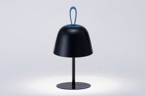 This minimal bell-shaped lamp functions as three lighting designs in one
