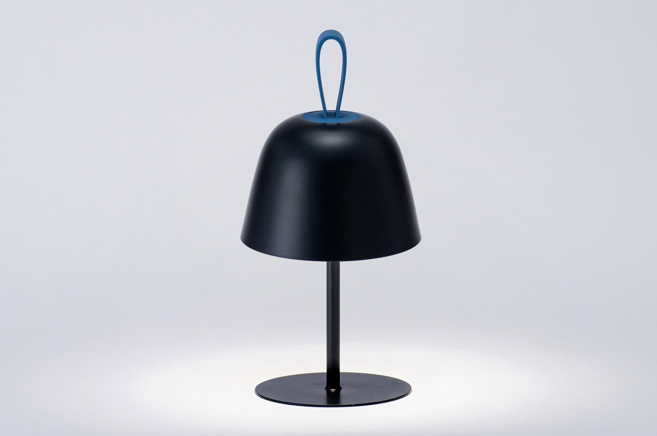 #This minimal bell-shaped lamp functions as three lighting designs in one