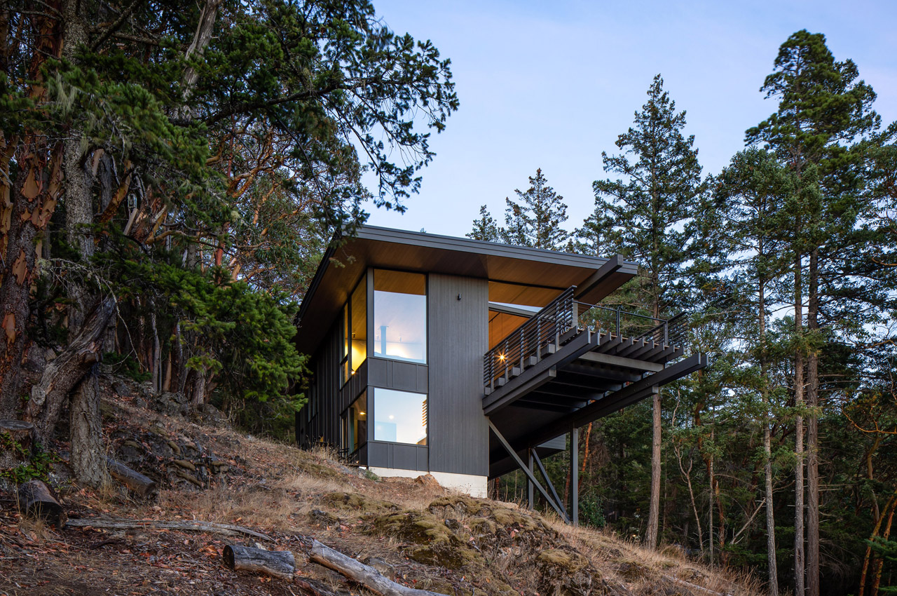 #This cedar-clad cantilevered cabin by Heliotrope was constructed with minimum site disturbance