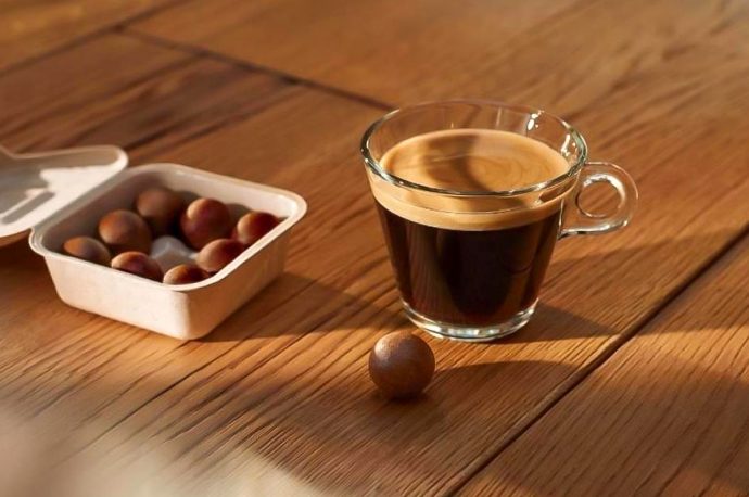 Eco-friendly coffee capsule machine uses coffee balls that can be turned into compost