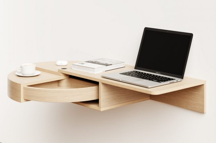 This wall-mounted desk has a revolving drawer inspired by a Matryoshka doll