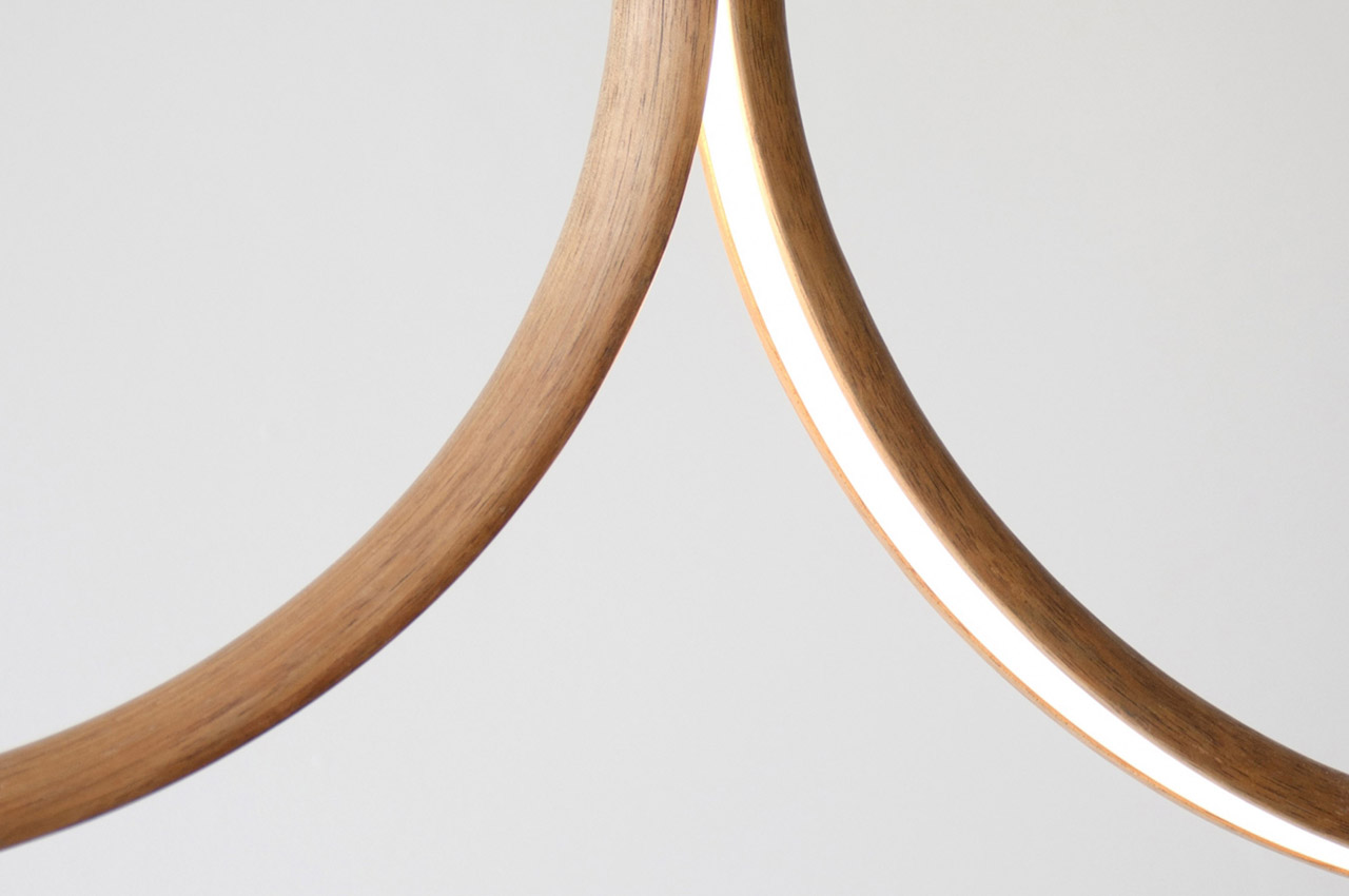 #These minimal handcrafted wooden lighting designs feature a split in the timber