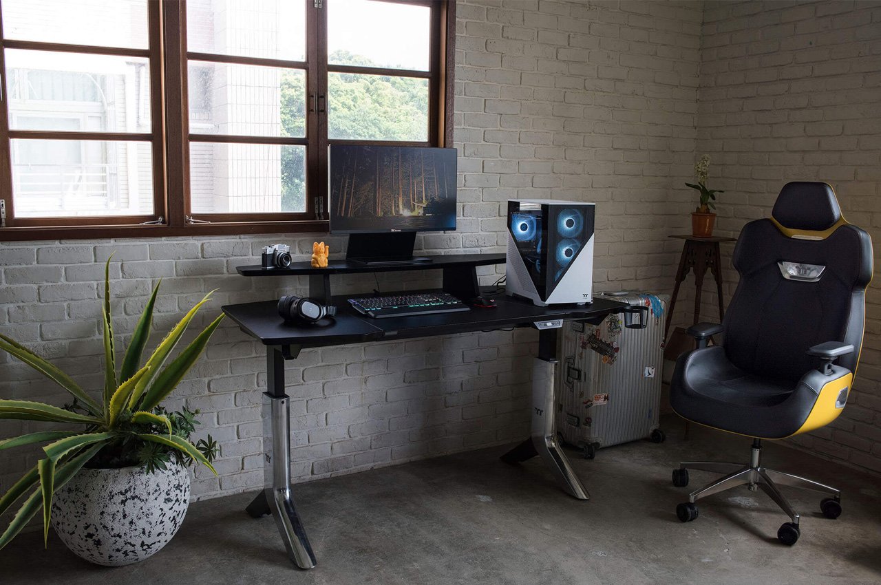 Designed by Studio Porsche & Thermaltake, this smart gaming desk is ready for a productive multimonitor setup