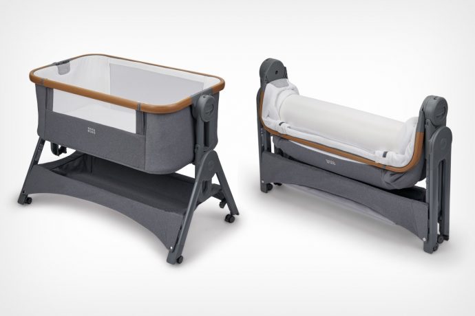 Portable crib with travel wheels and a foldable design can be stowed away or moved on command
