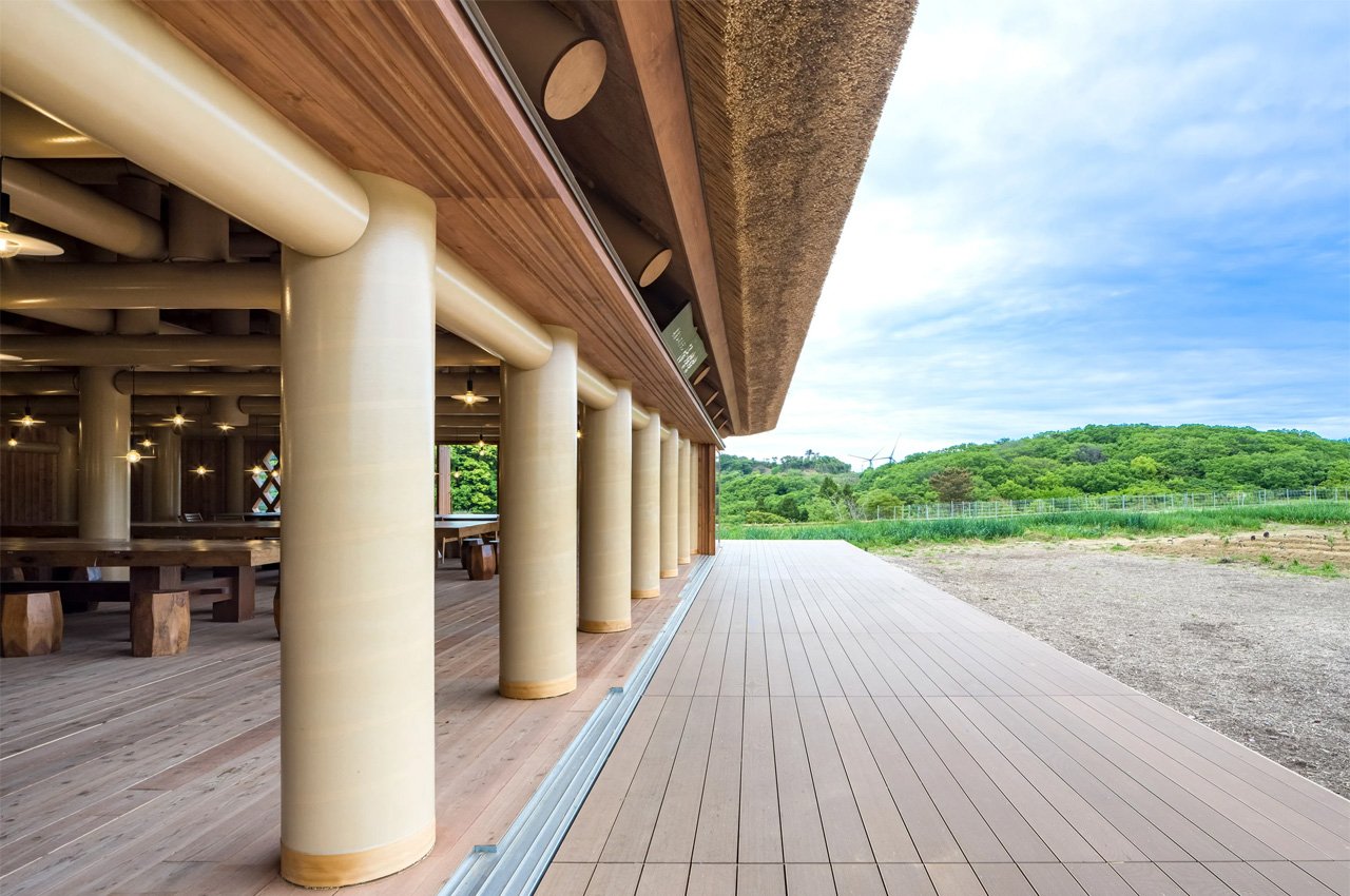 This restaurant on a Japanese island features a thatched roof and large cardboard tubes