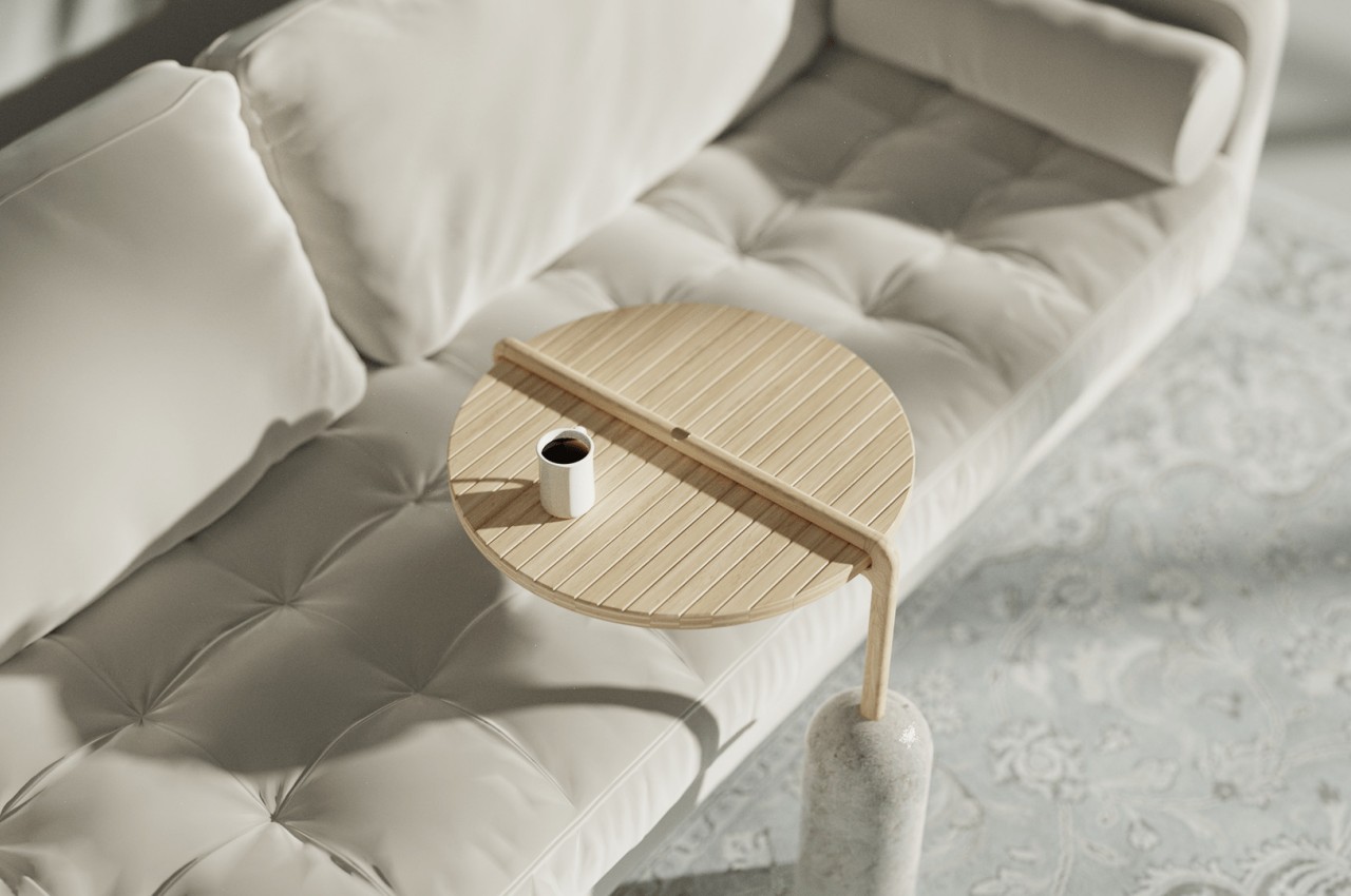 This folding side table uses a unique mechanism to save space when not in use