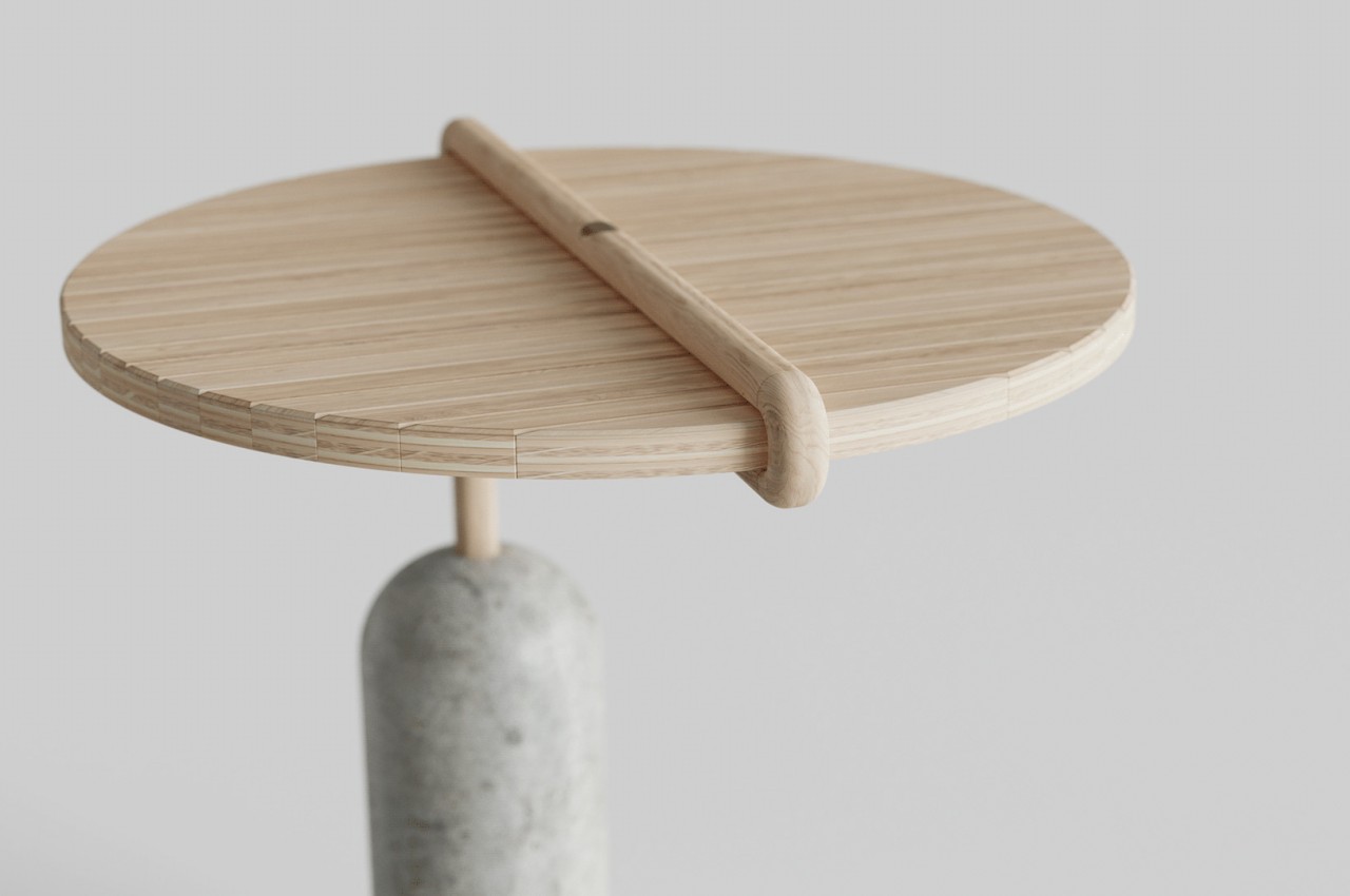 This folding side table uses a unique mechanism to save space when not in use
