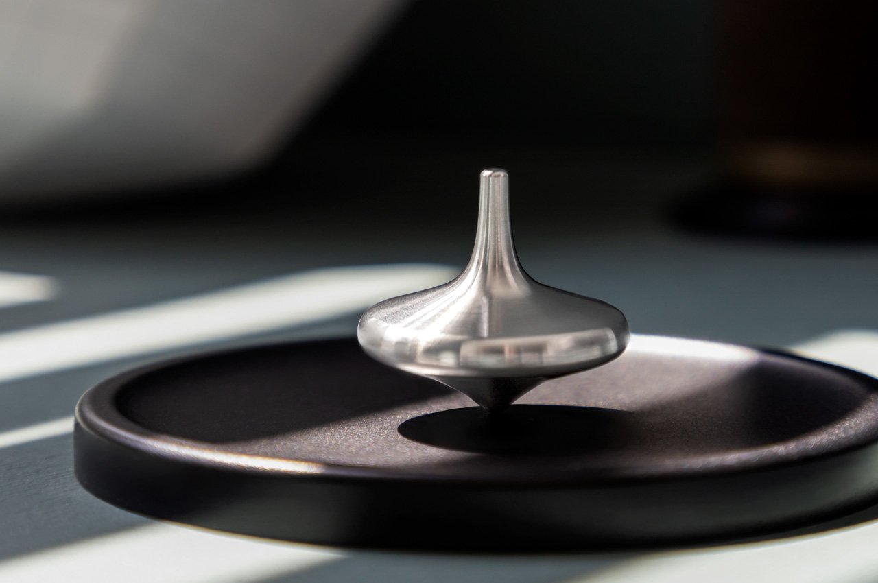 This sleek 'Inception Top' is a world-record-setting toy that spins for more than 4 hours - Yanko Design