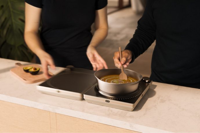 This modular induction cooker was designed to be compact and versatile for low-income households