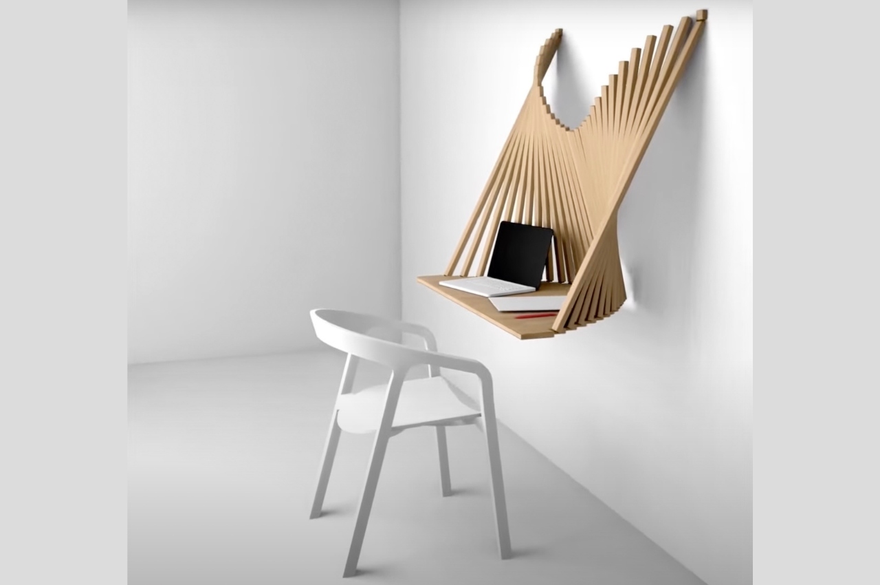 #Flow Wall Desk transforms from a work of art into a functional table