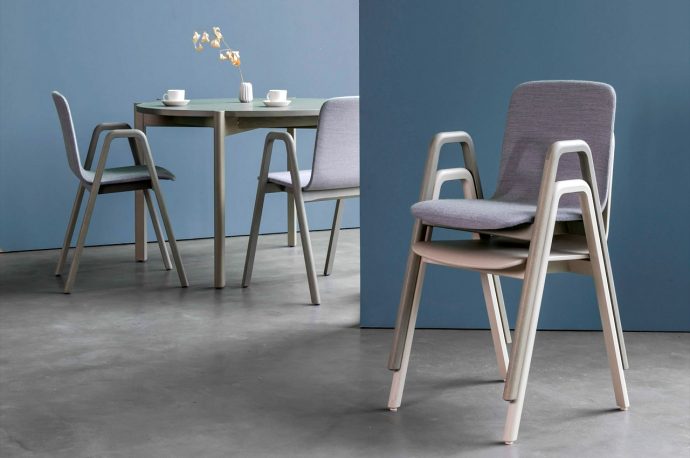 This solid wood stackable chair is ideal for public + private spaces