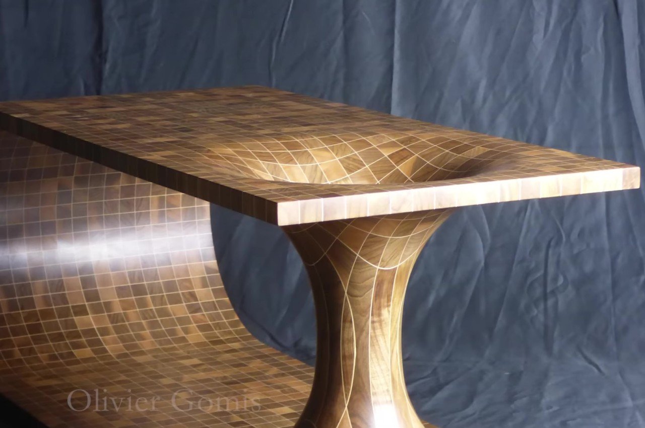 #This mind-blowing coffee table was painstakingly handmade with dozens of wooden strips