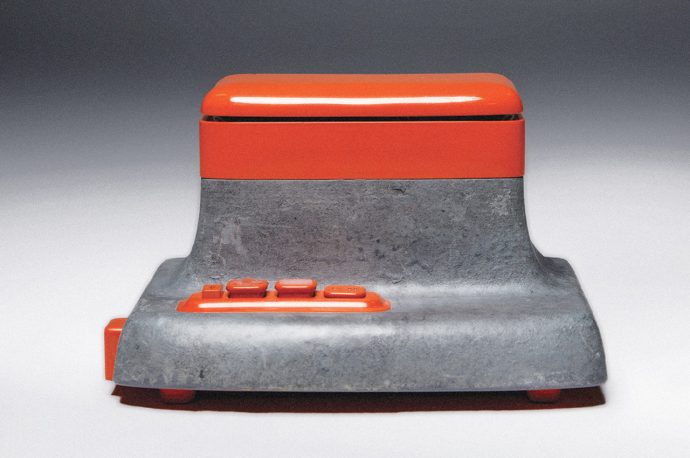 An orange – concrete speaker is a refined output from the bare aesthetics