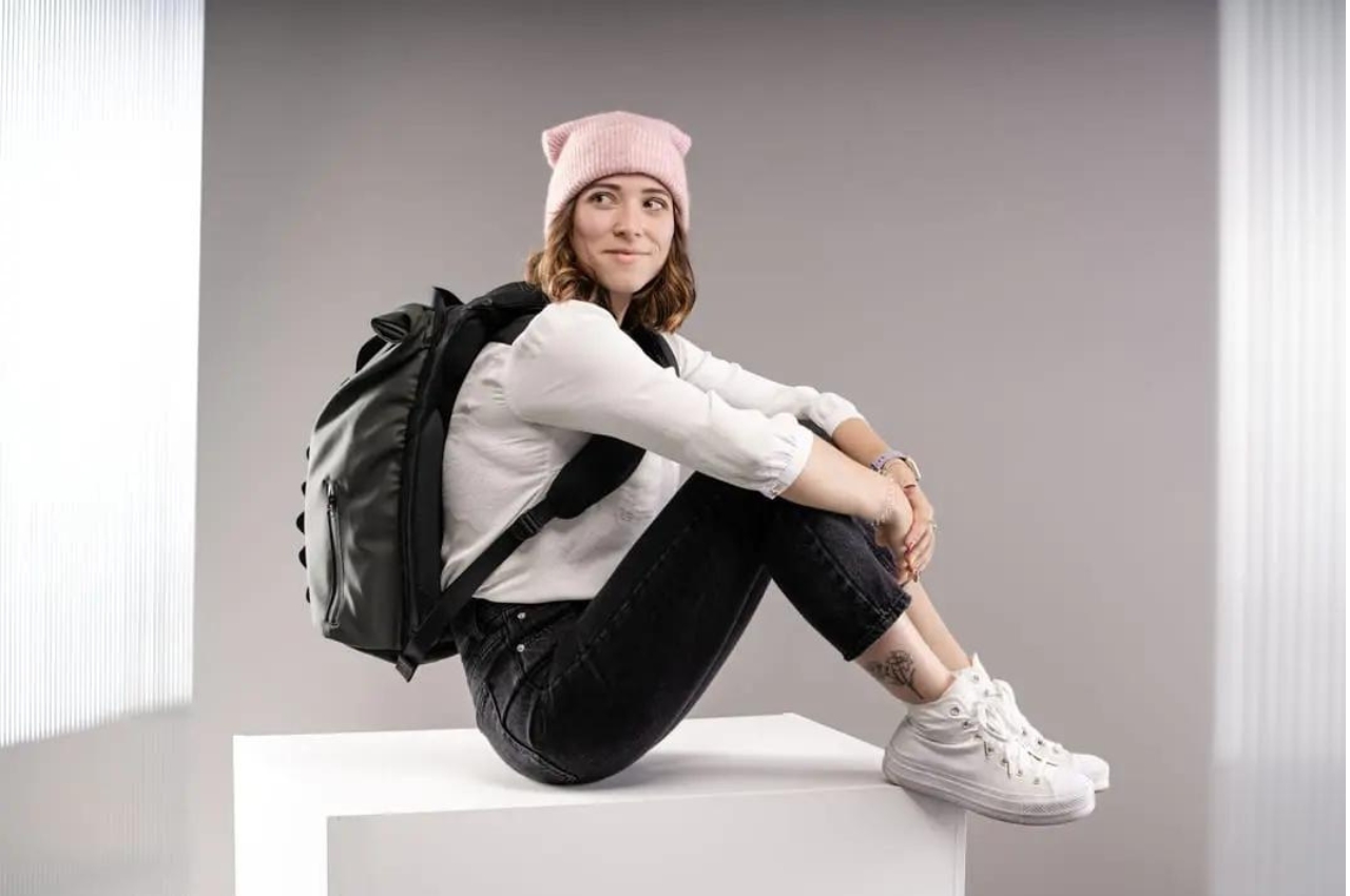 Bicycle airbag backpack blows up womb-like head and neck protection
