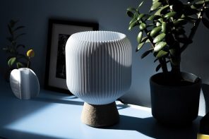 This clean minimal 3D printed lamp was made using recycled cardboard and plastic bottles