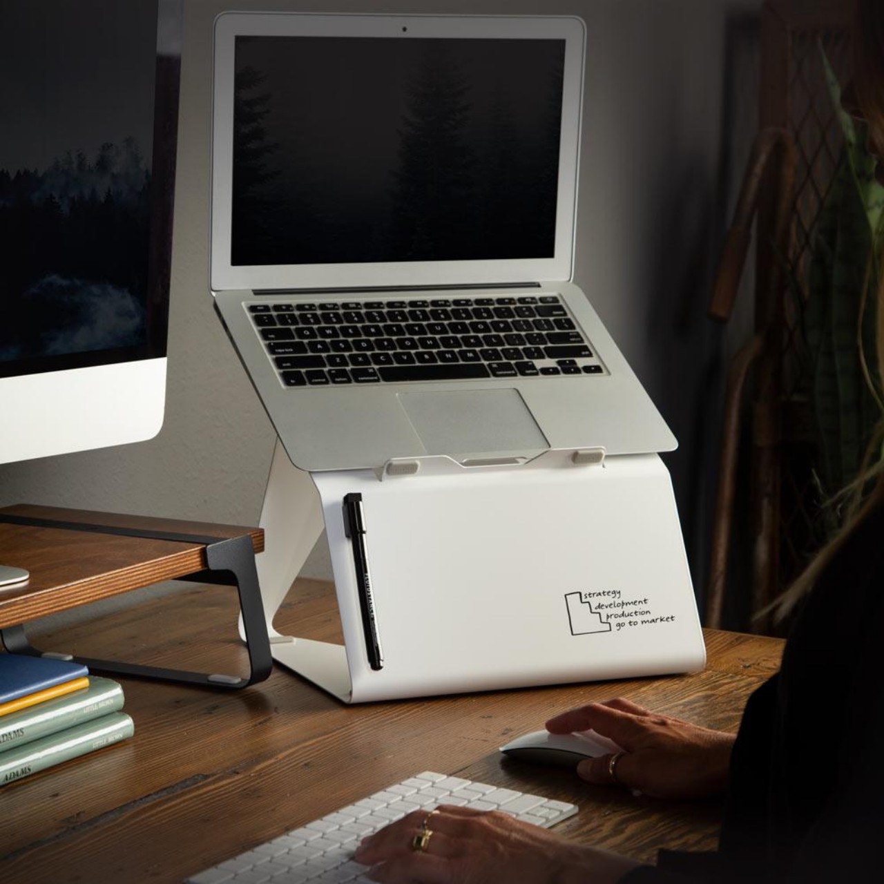 FluidStance Lift laptop stand has a whiteboard to also raise your productivity