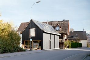 This rustic 1850s barn in Switzerland was transformed into a contemporary home with all-wood interiors