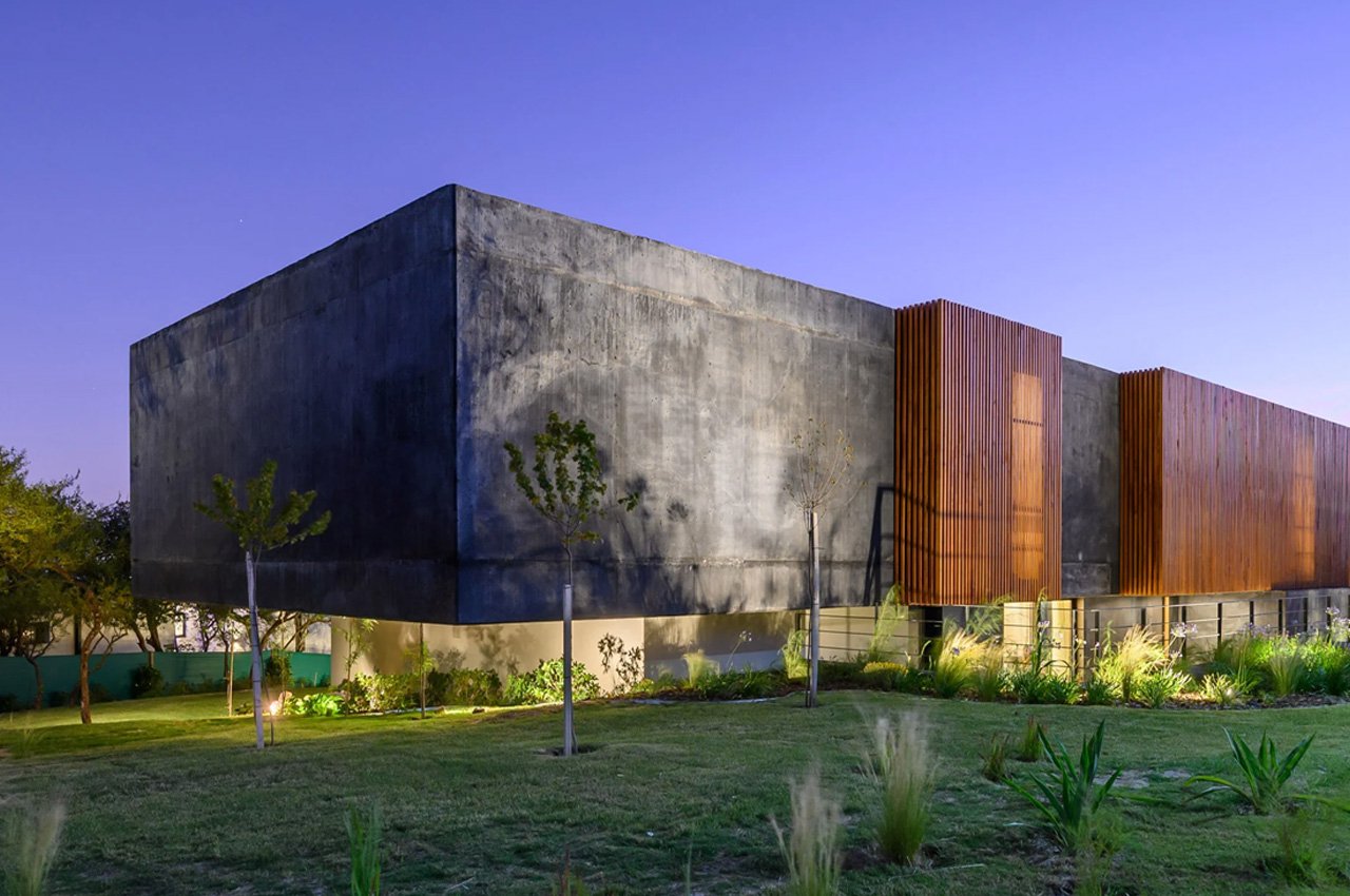 This Monolithic Black Concrete Home In