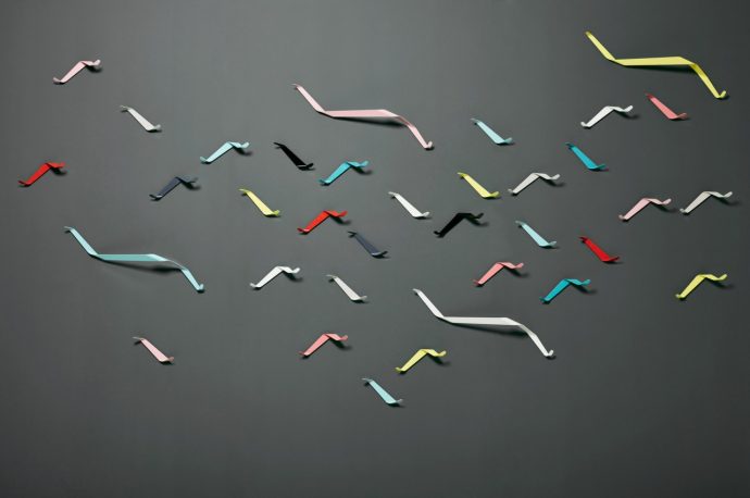 These quirky wall hooks look like squirmy critters crawling on your wall