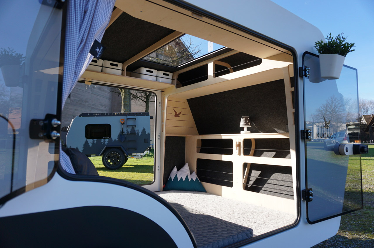 This micro camper with glass doors, oversized window and a skylight offers  panoramic ride and camping halt - Yanko Design