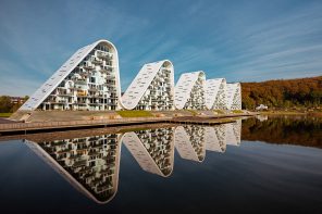 Eye-catching wave-shaped building adds a dynamic form to this Danish town’s skyline