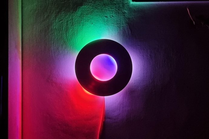 DIY wall clock is an enchanting way to tell time using prismatic lights