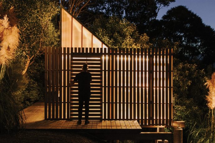 This wooden and polycarbonate shed in New Zealand glows in the dark