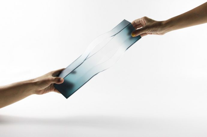 Transparent vases create an optical illusion of colors stretching into nothingness