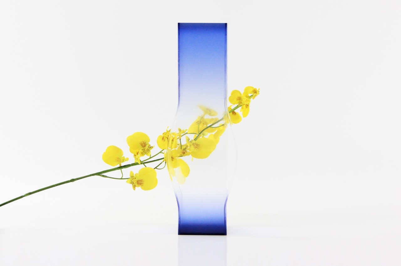 Transparent vases create an optical illusion of colors stretching into nothingness
