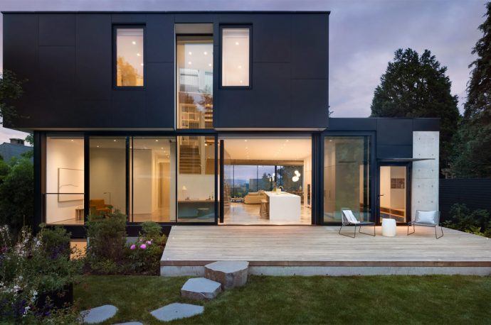 This minimal suburban home in Vancouver is defined by a visually weightless and sculptural staircase
