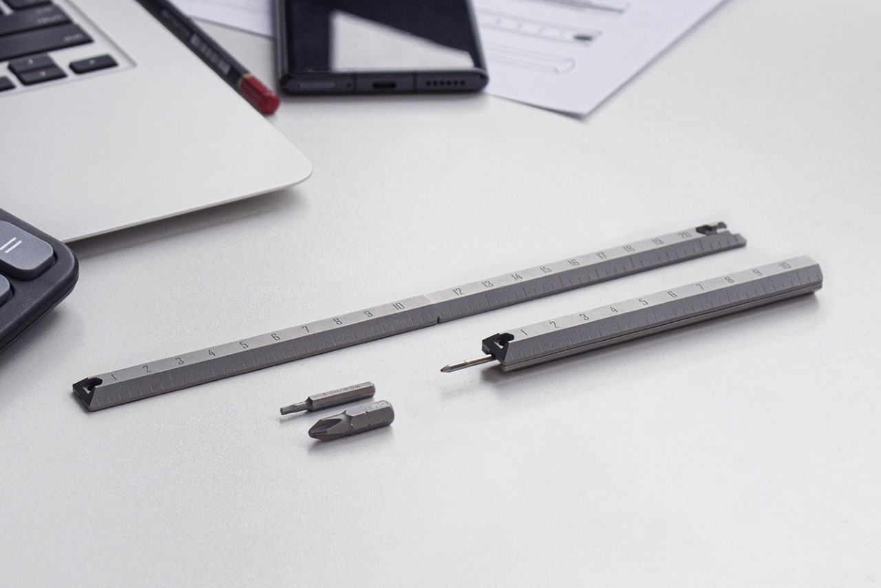This Titanium Multitool Ruler Pen is the ultimate all-in-one desktop stationery item