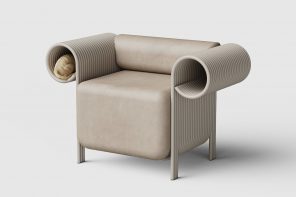 The Flow Sofa is a cozy armchair with spiral armrests that your cat can snuggle up in