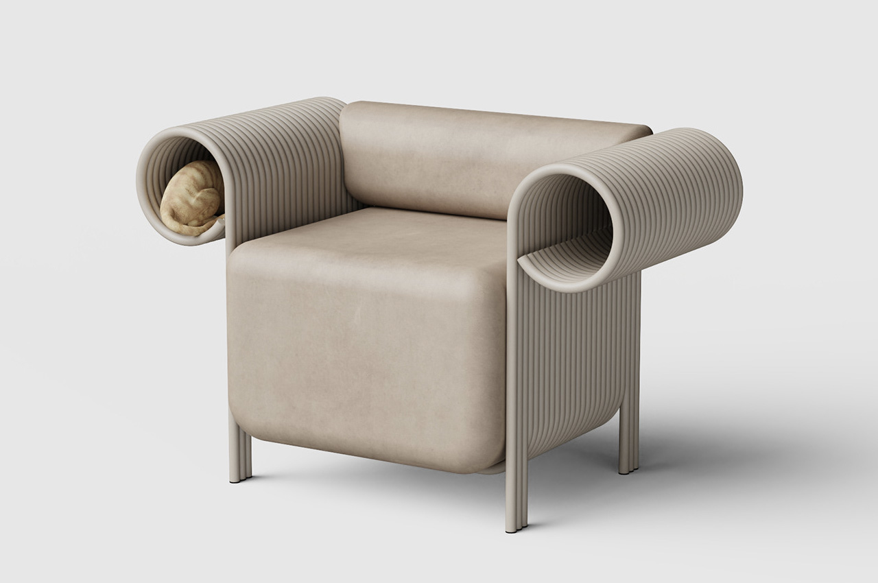 #The Flow Sofa is a cozy armchair with spiral armrests that your cat can snuggle up in