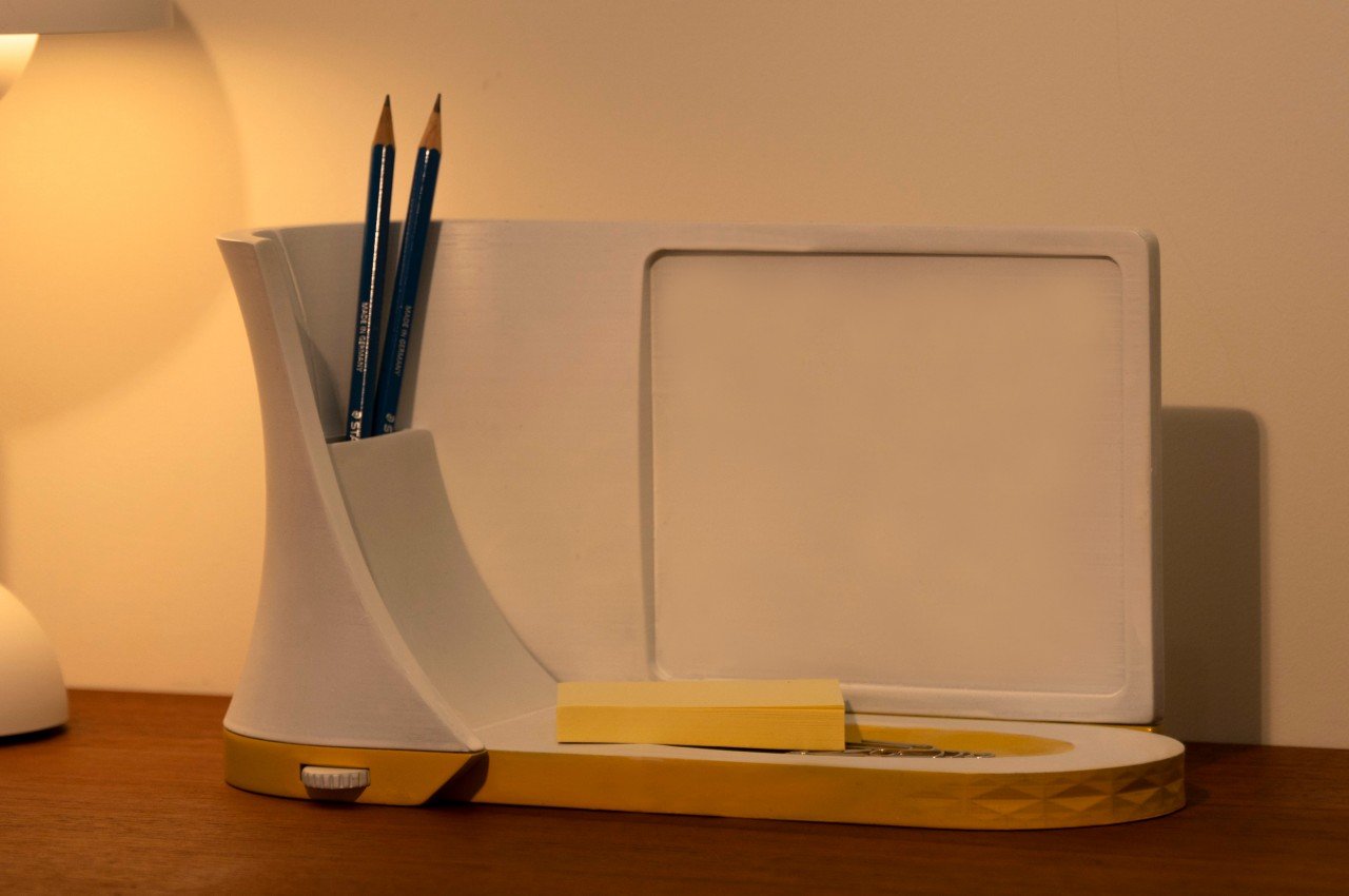 Multifunctional desk accessory becomes a scrolling photo frame for your favorite memories