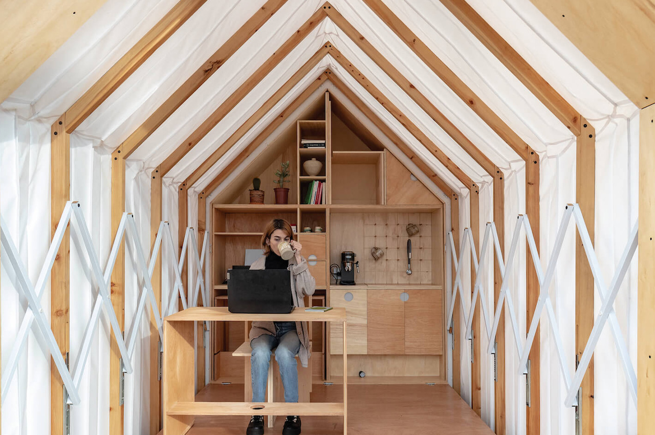 This collapsable cabin-like shed can be pulled open and compressed like an accordion