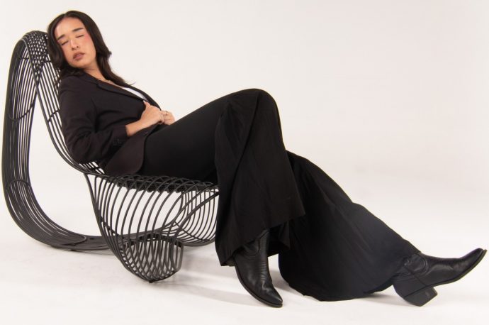Seashell-inspired chair combines digital and traditional techniques for a sculptural design