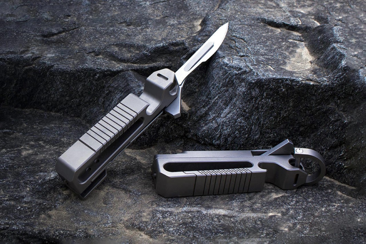 #The Only Tactical Multi-Tool You’ll Ever Need: This Titanium Pocket Knife + Glass-Breaker Conquers All
