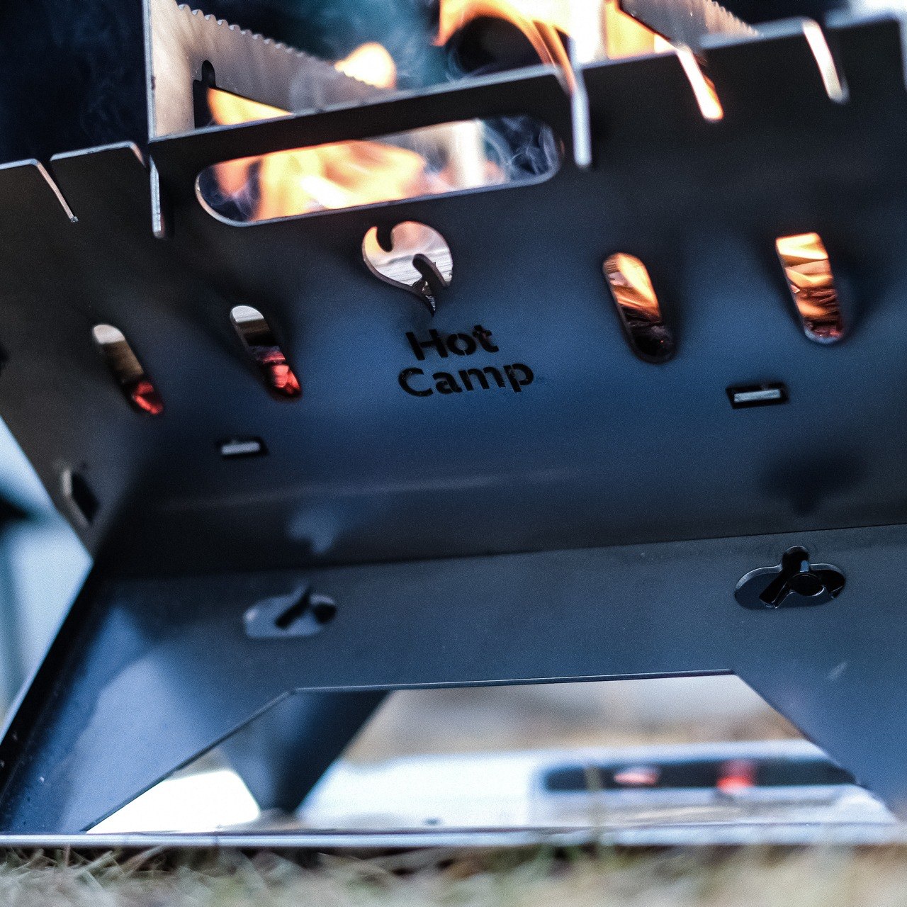 This foldable fire pit stand brings the joy of space-saving design to outdoor camping and meals