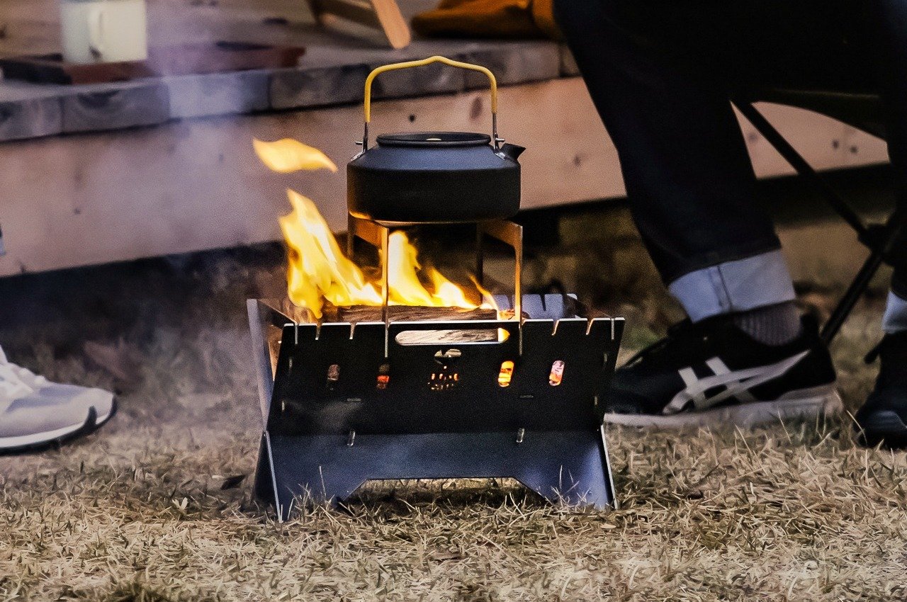 #This foldable fire pit stand brings the joy of space-saving design to outdoor camping and meals