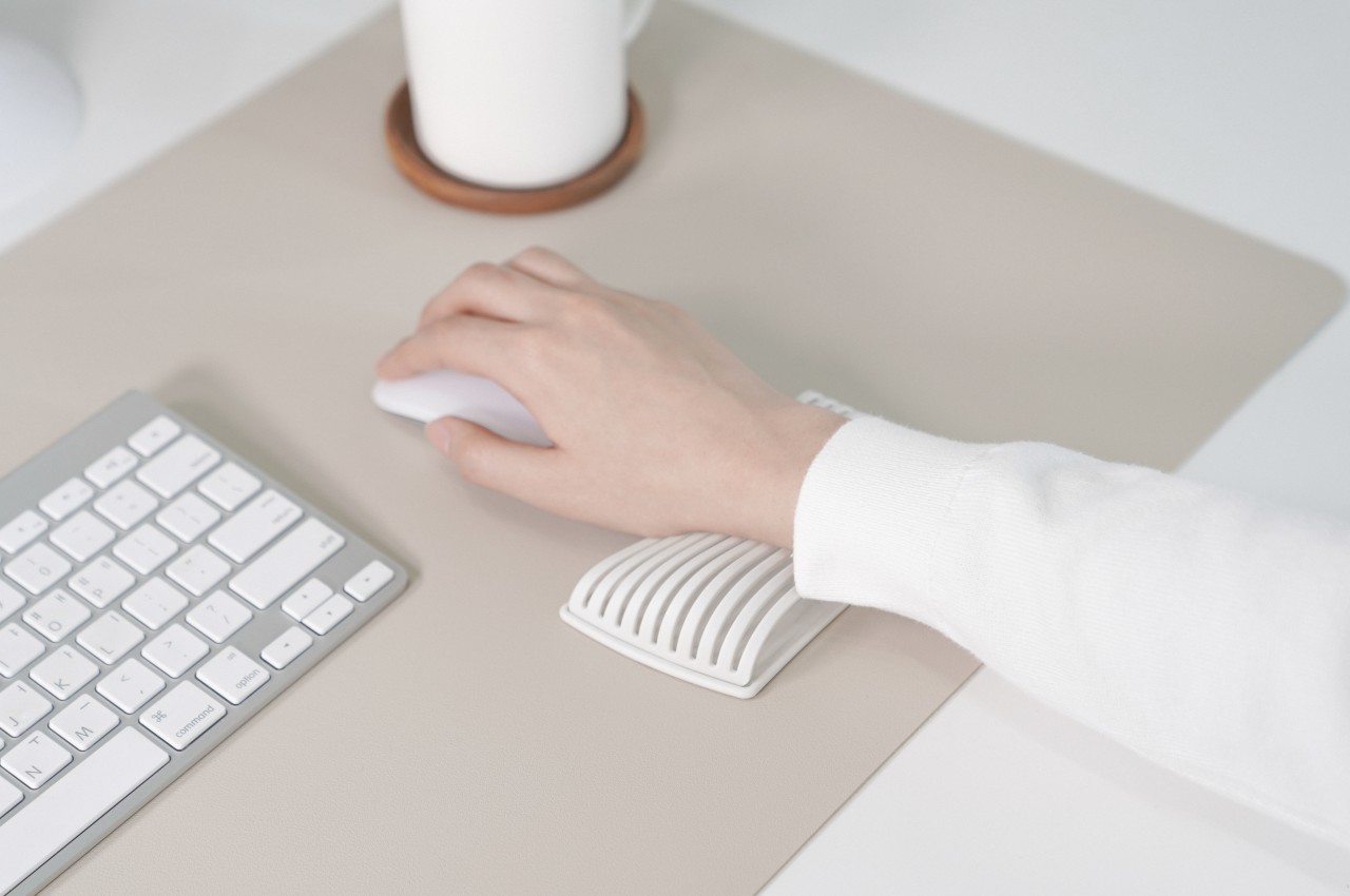 This mouse pad with wrist support adds durability and hygiene by removing parts