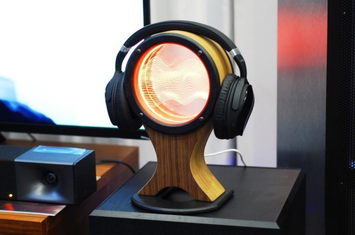 This retro-futuristic headphone stand puts a mesmerizing light display on your desk