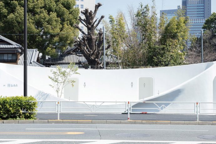 Tokyo’s quirky public toilet was designed to look like a large sink & includes a communal hand-washing basin