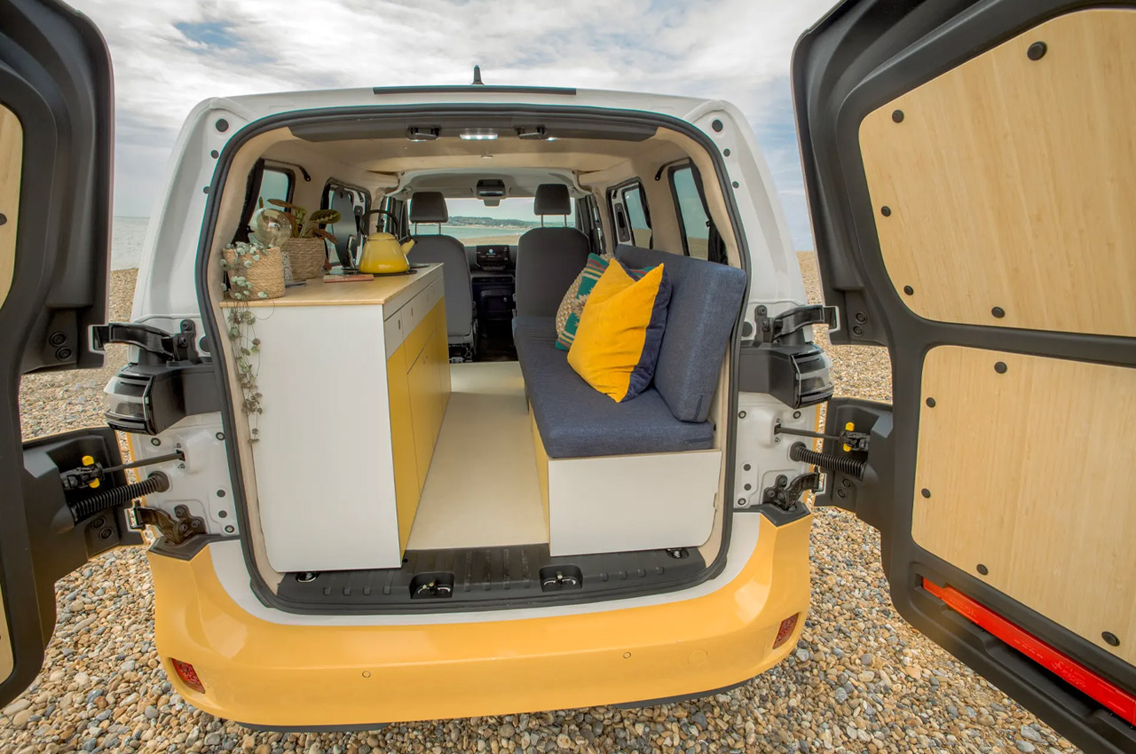 https://www.yankodesign.com/images/design_news/2023/05/vw-id-buzz-electric-camper-van-with-portable-toilet-and-mini-fridge-is-a-vibrant-luxury-hotel-on-wheels/Volkswagen-ID-Buzz-camper-van-3.jpg