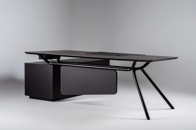 Arqus Desk is designed to replace the heavy + bulky furniture typically found in corporate offices