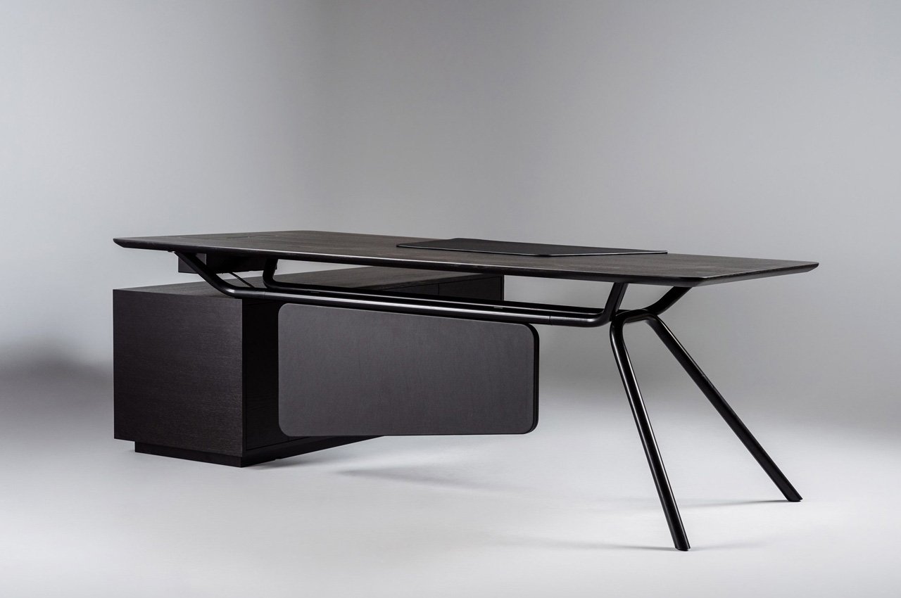 Arqus Desk is designed to switch the heavy + cumbersome furnishings sometimes present in company workplaces